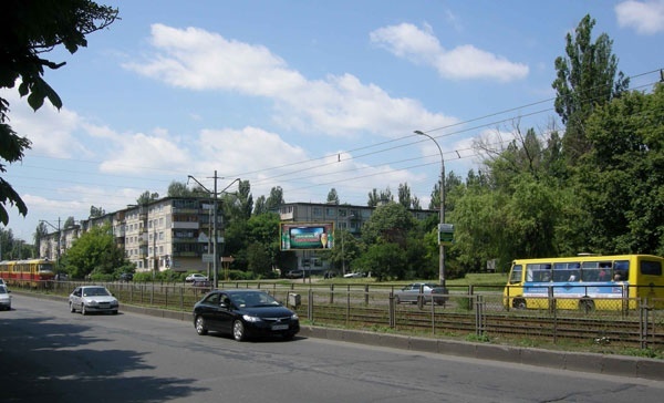 Щит 6x3, Пр.Леся Курбаса,2 (быв.пр.50-лет Октября)/ул. Героев космоса Щит 6x3, Пр.Леся Курбаса,2 (быв.пр.50-лет Октября)/ул. Героев космоса